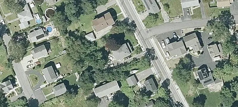 Duplex With Three-Car Garage