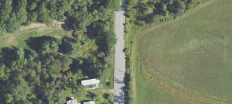 Wooded Hunting Land with Home