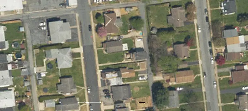 Three-Unit Triplex with Backyard