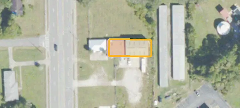 Fenced Warehouse with Roll-Up Doors