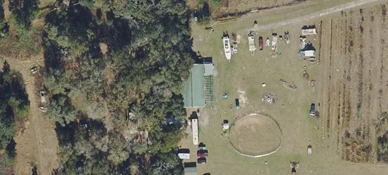 Land with Wells and Cypress Barn