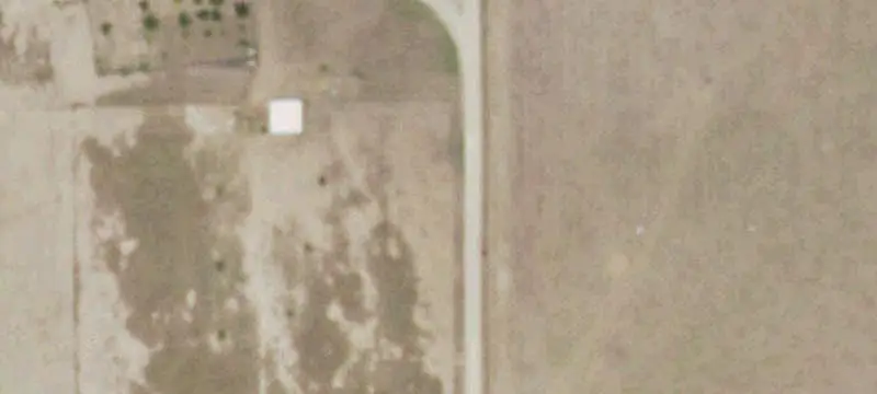 Fenced Farm with Metal Barn
