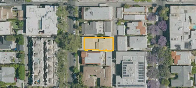 Seven-Unit Apartment Building with Rooftop Deck