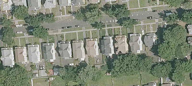 Duplex with Detached Three-Car Garage