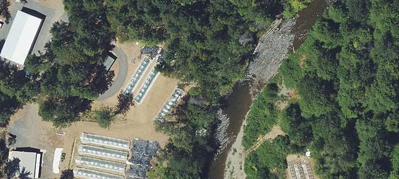 Waterfront Land with Metal Shop