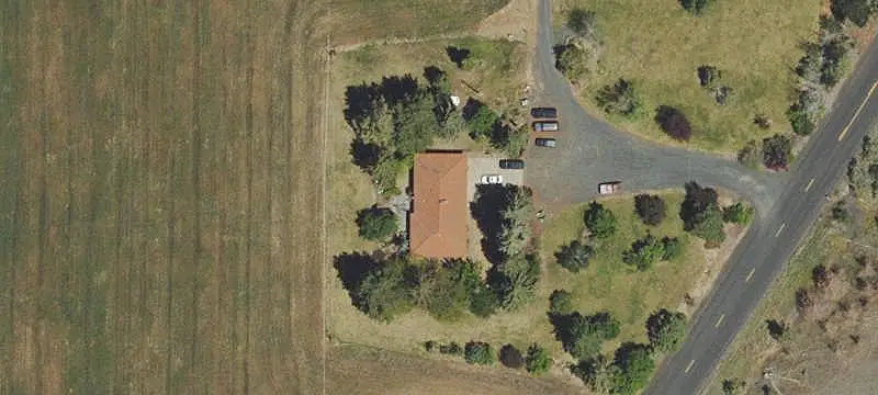 Ranch with Farmhouse and Barns