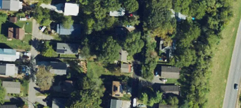 Three-Unit Triplex with Detached Cottage