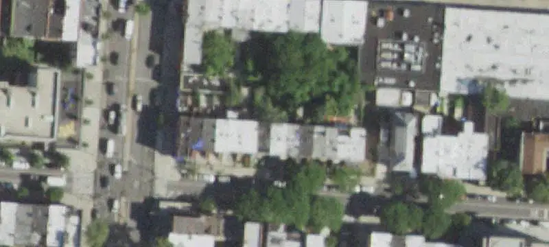 Two-Family Townhouse with Private Driveway