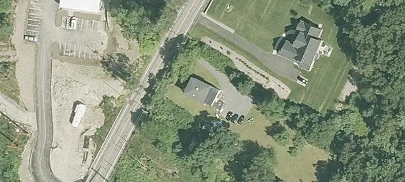 Two-Family Home with Expansive Grounds