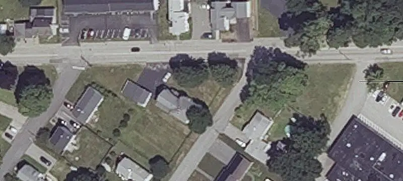 Updated Triplex with Four Garage Bays