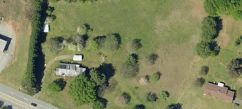 Commercial Land with Existing Home