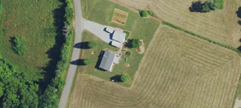 Fenced Farmstead with Barns