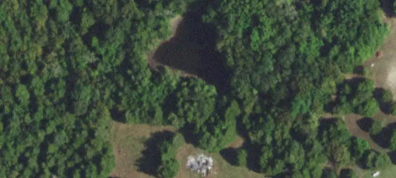 Acreage with House and Storage Building