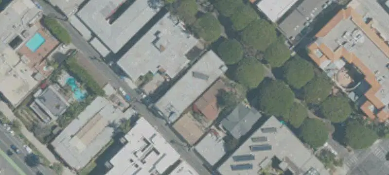 Apartment Building with Ocean-View Roof Deck