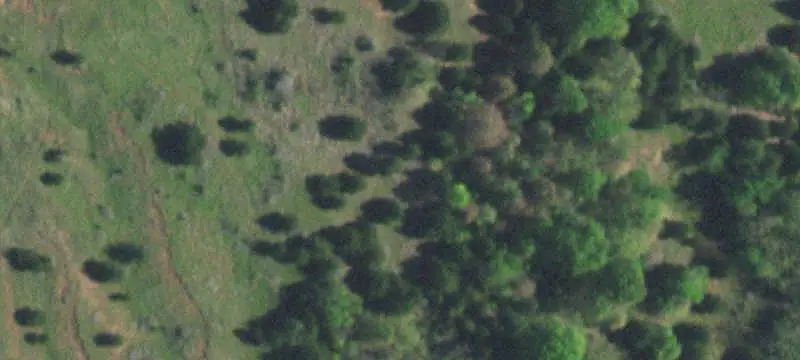 Fenced Ranchland with Pond