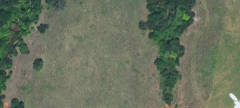 Farmland with Metal Buildings