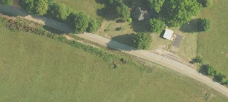Fenced Farmland with Barns