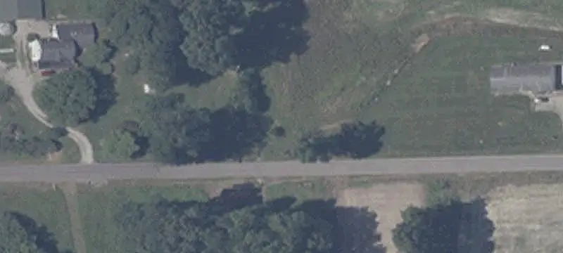 Farm with Home, Lake and Outbuildings