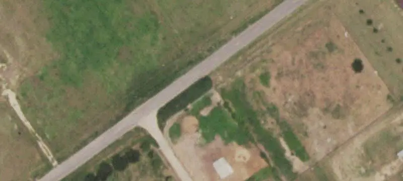 Ranch with Metal Barns
