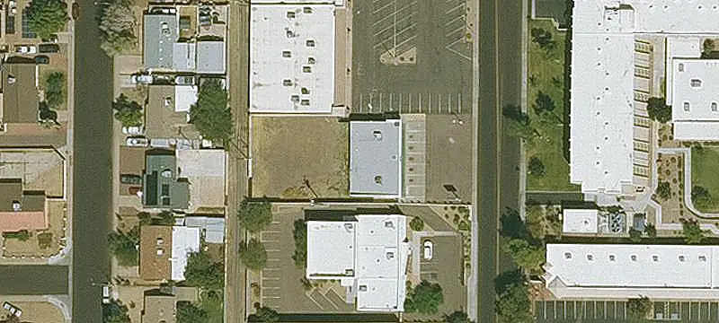 Storefront Property with Paved Rear Yard