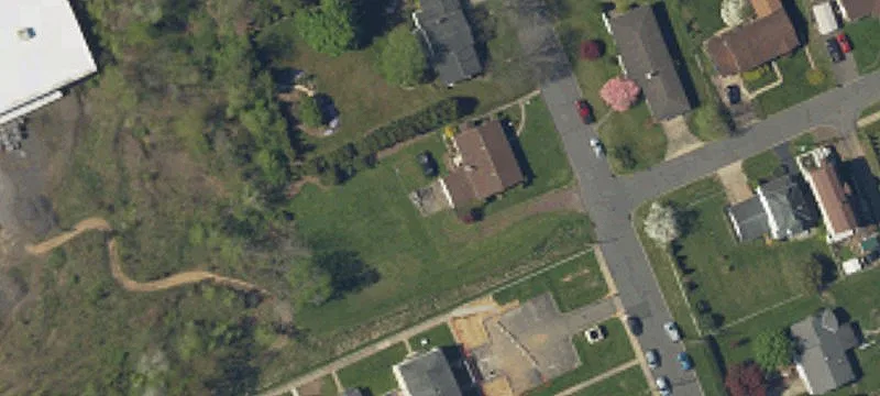 Wooded Land Near Development Projects