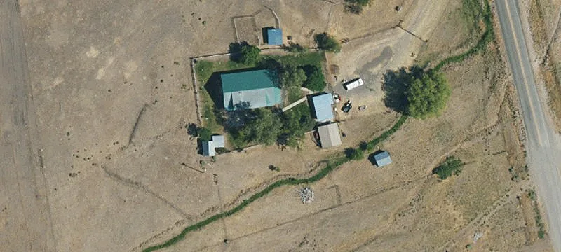 Farmhouse on Expansive Acreage
