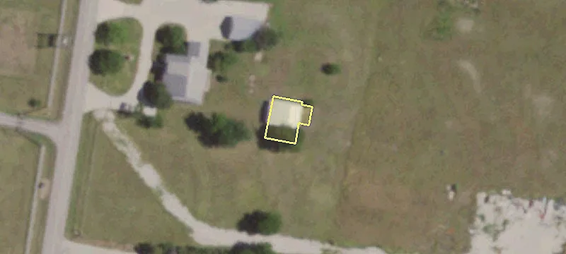 Unrestricted Land with Commercial House