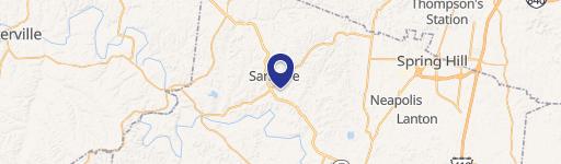 Expansive Land with Barns and Home