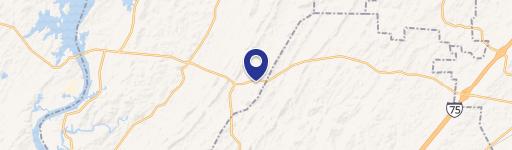 Partially Cleared Acreage with Well