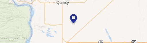 Paved RV Lot with Travel Trailer