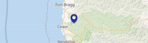 Forested Peninsula Land with Unfinished Home