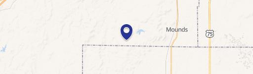 Wooded Land Parcel Near Mounds